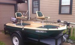 Just bought this fishing boat this past fall - selling it to buy a friend's boat. I have had a great time on this boat...
The boat is 11'3'' long, 5' wide. Two padded swivel seats. The casting decks have nice green carpet. There are many storage