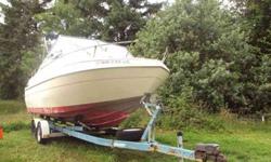 This boat is from Eastern Washington and has spent very little time in salt water. 350 V8 with Mercury out drive- Engine overhauled 2 years ago, runs great. Just needs cleaned up a bit. Easy load trailer with new tires. Comes with full tarp/canvas. Please