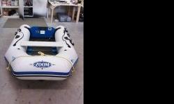 8' Zodiac Zoom. Oars,Storage cover,Pump, Complete. Comes with complete set of weaver davits.Rated for a 4 hp.