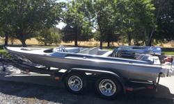 1976 Hawaiian jet boat w/fresh and fast Ford 460. Runs great & looks awesome. Water ready. Show your team spirit! Get lots of attention as you're flying on the water. Newly wired tandem trailer with LED lighting, chrome wheels & good tires.