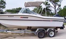 1990 20' STRATOS DUAL CONSOLE. 28 GALLON LIVE WELL, 75 QT FISH BOX. TWIN ROD LOCKERS, DOWN RIGGER AND OUT RIGGERS. KICKER MOTOR BRACKET. BUILT IN DEPTH FINDER AND VHF RADIO. BIMINI TOP. 1990 EVINRUDE 200 (VRO 2 STROKE). ALSO HAS A STAINLESS STEEL PROP.