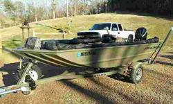 2011 Tracker Grizzly 1448 with 20 horsepower Mercury 4stroke, new low hrs, welded .100 hull, Avery blind, rod holders, trolling rig, 2 fish finders, gun box, custom front lamps, neomats in floor, Motorguide foot control trolling engine, more accessories,