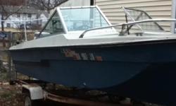 16 foot trihull, with walk-through windshield, 75hp Johnson motor 1977. Boat 1976 model. $600 obo for boat/motor/trailer. Boat is in Emporia, KS. Call 620-794-7663 if interested. Ask for Ray.