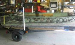12' Aluminum Boat, Trailer w/ new paint, boards, guide posts, carpet & rope, older five horsepower Eska gas motor (as is), new 32lb. thrust MinnKota trolling engine, oars, anchors, life vests, rope, seats. Gas motor runs but we cannot make any gaurantees