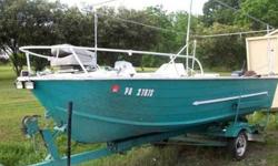 Here's a 17 foot boat with a motor and trailer. The motor does run. The inside of the boat, does need a little TLC, however after the TLC it will be ready for the water. The trailer matches the boat in color. Has 3 seats as well as benches inside, for