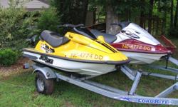 Two Jet Ski's and double trailer for sale as package2001- Kawasaki 1100 ZXiTwo seater, Fast, with trim control, this one turns on a dime, garage kept in winter, approximately 90 hours. 2000- Kawasaki 1100 STX DiThree seater, with reverse, this one rides