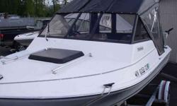 1984 18' Tiderunner cuddy cabin boat. Feels like a 20' with all the room. Self bailing floors. Freshly rebuilt 140 horsepower 2 stroke Johnson/Evinrude OMC SeaDrive. New canvas with drop curtain. Upholstery is like new. Fish finder, plumbed for Scotty