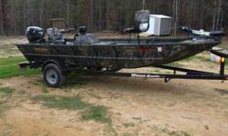 2006 TRITION 1650 SC-BOMBARDIER 16 ft mossy oak camo bass boat. Evinrude 50. Trolling engine,livewell,dry storage $7,500.00 706-466-2735 .See item listed at http
