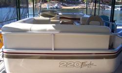 125 hp Mercury outboard moter, AM/FM/CD system, changing area, bamini top, snap on cover, table, upholstery in excellent condition, no trailer, Boat located at Smith Lake. Addtional information call 256-606-2460.