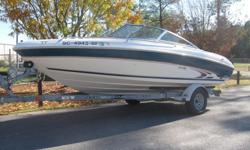 1998 Sea Ray 190 Signature (19 feet long). It has a 4.3L V6 Mercruiser I/O engine, and comes with a single axle trailer with brakes. It runs great, pulls skiers and tubes all day long on a tank of gas. The boat also has a full cover with poles, snap in