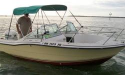 This is a 20 1/2 ft. Stratos with a 1997 225 hp Ocean Pro Johnson Outboard Motor. Located in Fort Myers, Fl. Real FRESH WATER boat from Lake Erie. With hydralic steering, trim tabs, front deck casting platform, depth sounder and bimini top. This is a very
