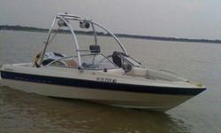 18 foot Bayliner with wakeboard tower and a jam system it will hold 7 people. its a 2005,