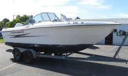 1992 Hydra-Sport 2000 DC Dual Console Boat powered by a 2000 Evinrude 200 hp Fuel Injected outboard engine. This is a very spacious dual console that is set up for fishing or cruising around with friends and family. She features walk-thru windshield to