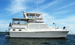 Uniflite Double Cabin with twin Detroit diesels, 350 hp each. The forward guest cabin has a walk around very comfortable berth with head, shower, sink, hanging locker. Moving aft is a full galley with dinette, full refrigerator/freezer,