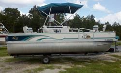 This pontoon boat is in great shape and ready for the water! Everything has been gone through and works as it should. It has a nice design, and built with quality. The underside has an aluminum shield to protect the deck and add stability. -40 HP Yamaha