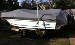 1996 Angler 205 Dual Console fish/ski boat, 1998 Suzuki 140 direct injection 2-cycle gas sipper w 514 hrs, Loadmaster float on trailer. All safety gear, life jackets, lines, new Lowrance color chart/fishfinder, boat cover, bimini top, ski stanchion. New