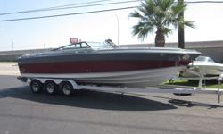 This is a rare find of a Four Winns 261 Liberator with the OMC King Cobra 460 (430hp each) motors sitting on a nice triple axle trailer ready for the lake. It has the side exhaust, stainless props, and custom swim platform. This is a boat that a buddy and