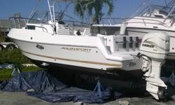 2000 Aquasport 24' Tournament Master with 2001 Evinrude 200 This is a 1 owner vessel with 381 original hours, hard top, rod holders, livewell, Garmin 185 gpsmap depth finder, ship to shore radio, cabin has porta potti that is plumbed so you just pump it