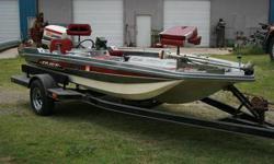 1977 Master Craft Cajun Bass Boat, 85 Horse Johnson Engine, 16 foot, trolling motor, fish locator, built in gas tank, 2 live wells, motor has tilt, share tire for trailer, less than 200 hours of use, last time in water wash 1987, motor needs pump, priced