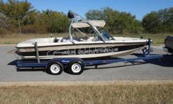 Competition Wakeboard/Ski boat: D-drive with Upgraded PCM Pro Boss GT 40 5.8 liter V8!! This Boat is super nice with 434 Hours of fresh water!!!! It comes with matching dual axle trailer. Depth finder, ballast system, walk thru transom, docking lights, Cd