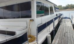 50 Ft. Gibson Crusader Houseboat with a Twin 454 Crusader and Kohler Generaator located in Mountain Home AR. at Lake Norfolk. Remodeled from ceilings, walls, cabinets, counters ect. has a master bedroom in back and two queen beds in loft, 1 1/2 bathrooms
