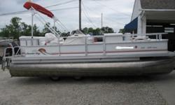 models in bronze (base), silver and gold packages. Upgrading from bronze to silver nets tilt steering, docking lights, a ski tow bar and heavier-gauge carpet. The gold package features a fiberglass helm, mid-back captain's chair with armrests, and