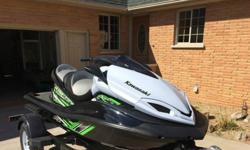 Excellent Condition, like new ONLY 18 HOURS.Comes with Haul-Rite Trailer and Kawasaki cover (that has never been used). Fresh water use only , always stored inside. We had it winterized this year by a Kawasaki Dealer so it was stored correctly. Title in
