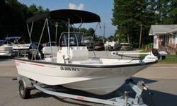 Just in!!! This LOADED to the GILLS (no pun intended) 2014 Boston Whaler 170 Montauk. This boat literally looks new inside and out. It come loaded with the following options that you do not get on a standard 170 Montauk:Raymarine chart and