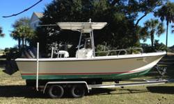 1992 Parker 21' Sport powered by a 2001 Yamaha 225 OX66 riding on a beefy Loadmaster tandem axle aluminum trailer. This package is ready to be put in the water and run, she?s just looking for a new owner to put her to use. Super solid deck and transom,
