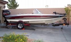 A broad 96" beam provides an extremely stable fishing platform as well as a smooth, dry ride. The front deck houses oversized storage boxes, a cooler, an aerated baitwell along with the convenience of a folding deck extension. The driver's console is